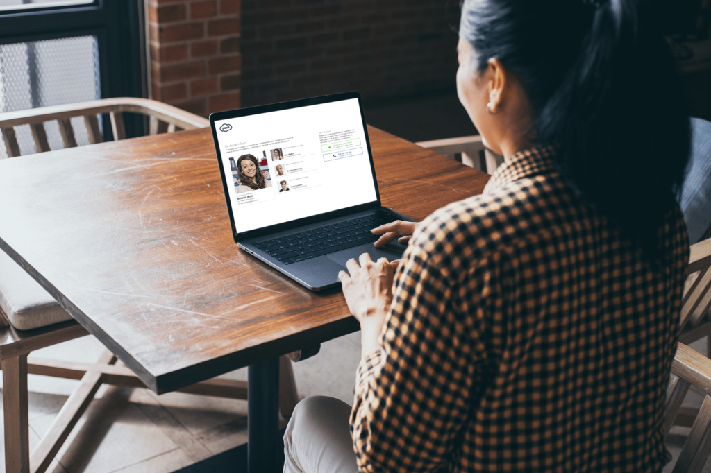 Woman explores the new Account Team widget in the Pax8 Platform.