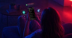 woman holding smartphone with email security overlays