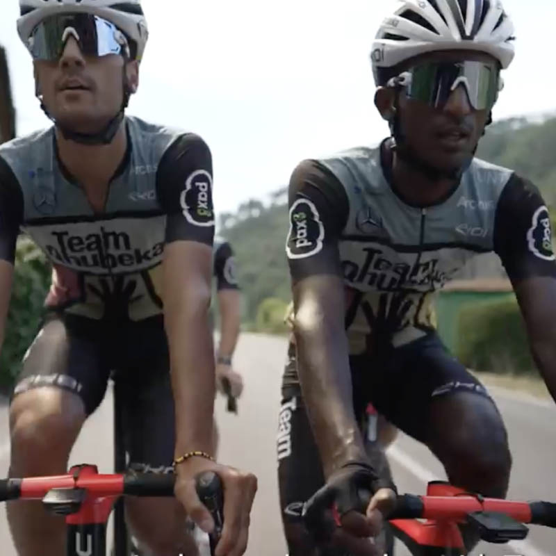 Pax8 employees riding at a charity bike race