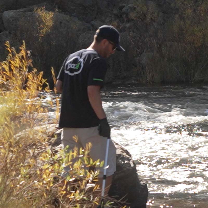 Pax8 employee during a stream cleanup event