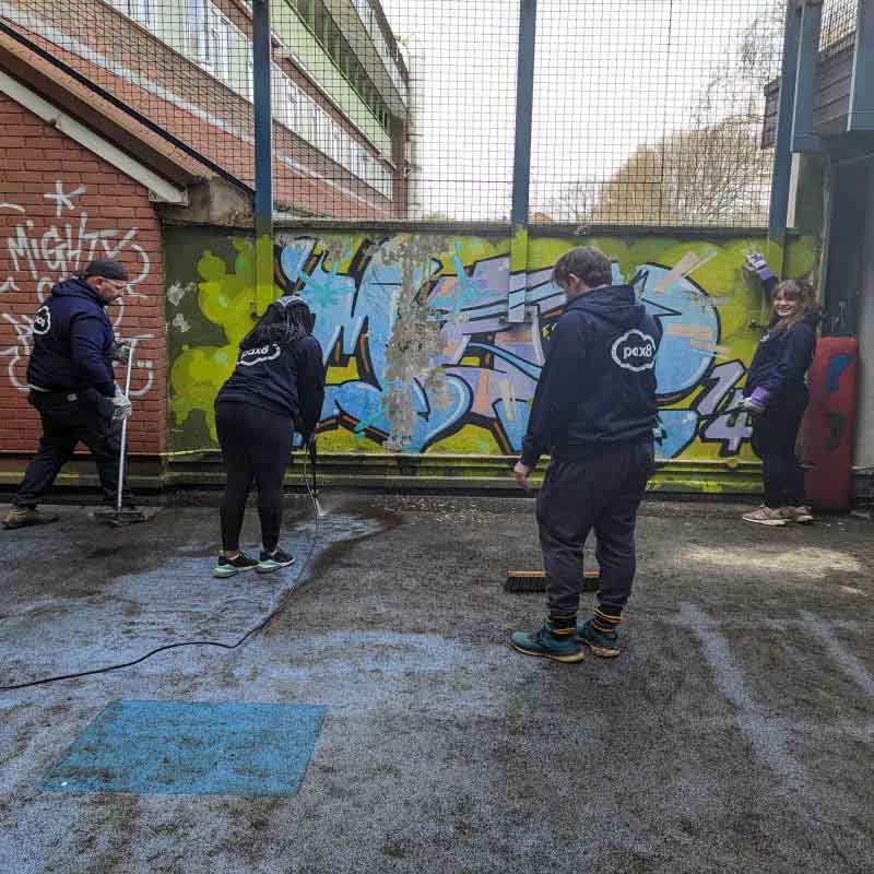 Pax8 employees at a graffiti cleanup event