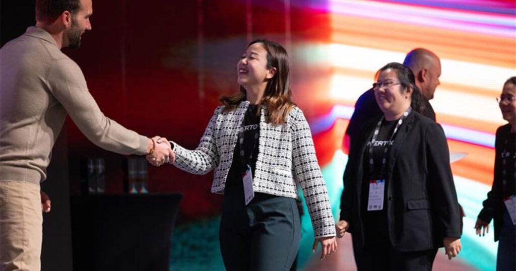 Pax8 partner receiving award on-stage at Pax8 Beyond