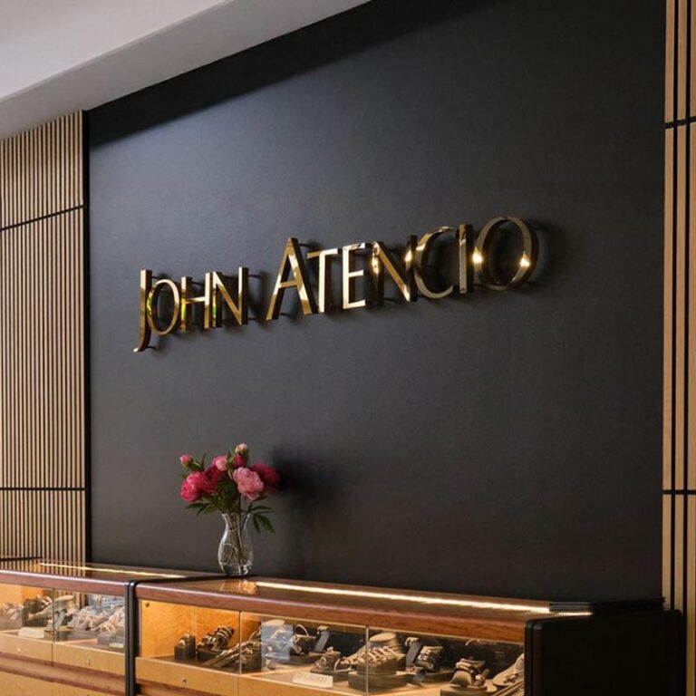 John Atencio office wall logo