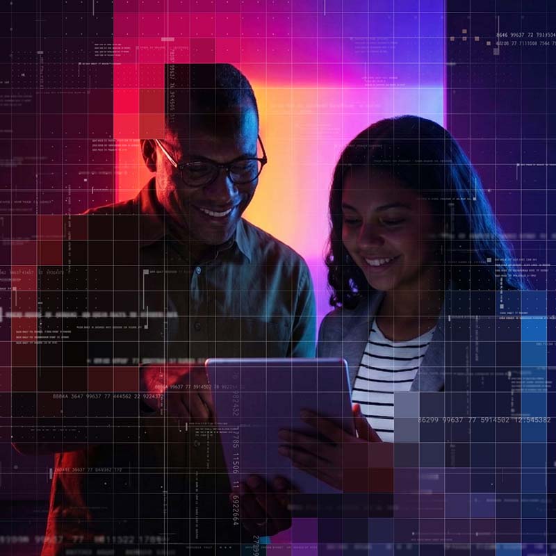 two people using an iPad together